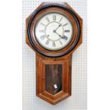 A circa 1900 Japanese oak cased drop dial wall clock, thirty hour gong striking movement faced by 10