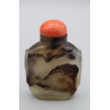 Snuff Bottle. Chalcedony of rounded rectangular form, on a broad footrim, with tao tie mask
