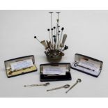 Three cased silver lace makers bobbins, The Queens of England, each with certificate. Together