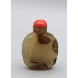 Snuff Bottle. Chalcedony of flattened ovoid shape on a broad raised footrim, tao tie  mask handles