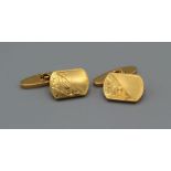 A pair of yellow metal chain link cufflinks, engraved with foliate patterns, gross weight