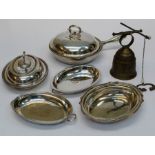 Four EPNS vegetable tureens, a covered chafing dish and a reproduction Dutch brass bell