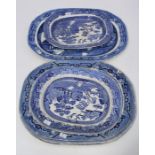 A 19th Willow pattern meat platter, 49 x 36.5cm, together with three others, 46 x 36cm and two