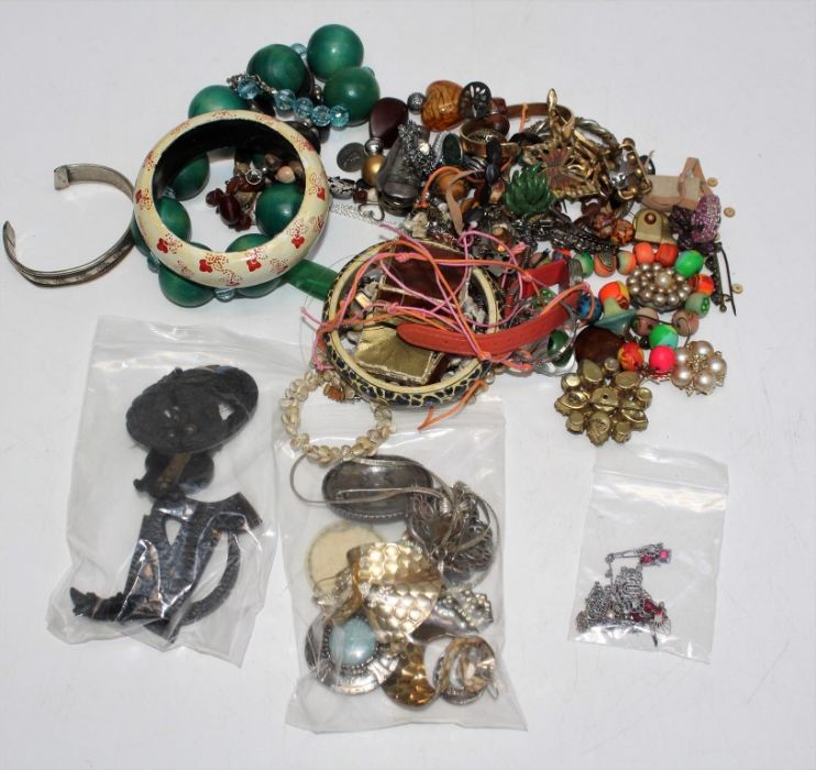 A selection of antique, vintage and cotemporary costume jewelley. To include two red paste Art