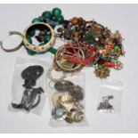 A selection of antique, vintage and cotemporary costume jewelley. To include two red paste Art