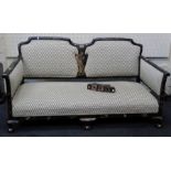 A circa 1920's two person salon settee, with black lacquer painted and Chinoiserie decorated show