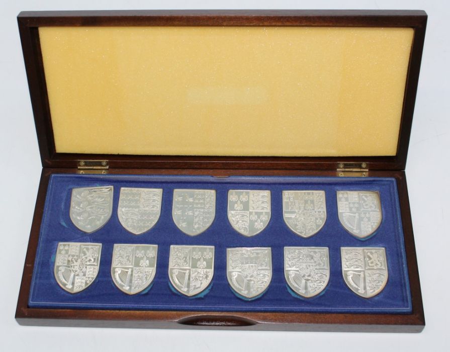 Set of twelve single ingots The Royal arms collection produced by The Danbury Mint 1976, the set