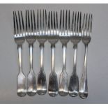 A selection of seven sterling silver fiddle pattern forks. Approximately 558gm
