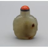 Snuff Bottle. Chalcedony of flattened ovoid form, on a broad footrim with tao tie mask handles at