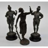 A pair of 19th century cast spelter figures of Cavaliers, 38cm together with another, emblematic