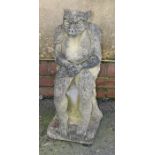 A nicely weathered reconstituted stone model of a gargoyle, seated upon a plinth, 72cm high
