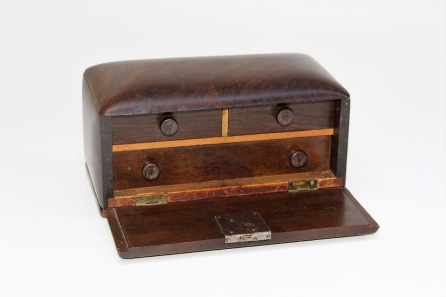 A small, early 20th century rosewood jewellery box, the fall front enclosing two short and single