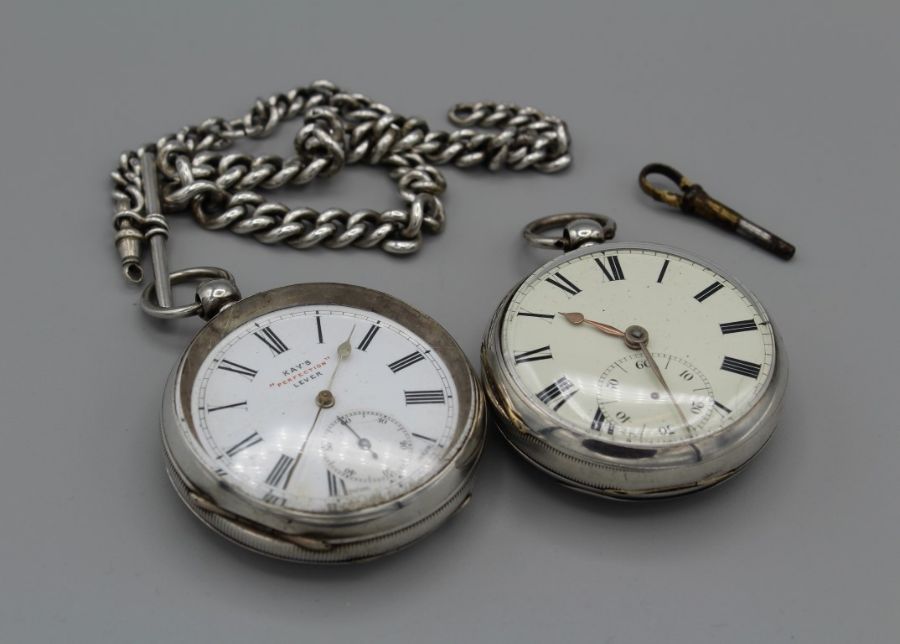 A pair of key wound pocket watches, one marked 935, the other a sterling silver watch with