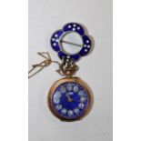 A yellow metal ladies watch, with an attractive blue guilloche dial with Roman numerals in white