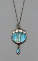 An Edwardian bright aquamarine colour champleve enamel Arts and Crafts style pendant, in sterling