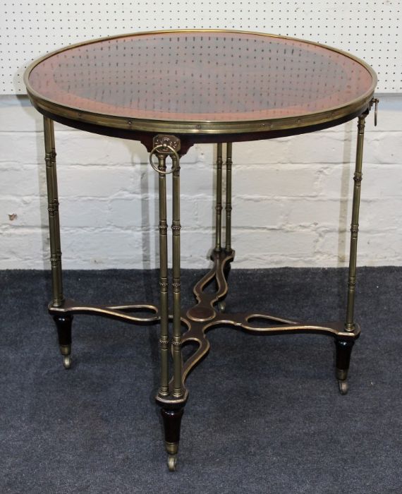 Wright and Mansfield, a Louis XVI style mahogany and gilt bronze gueridon, the circular top raised