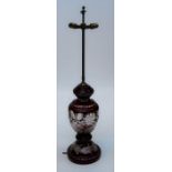 An early 20th century Bohemian ruby flash glass table lamp of generous size with twin brass light