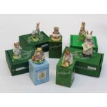 A group of Beswick Beatrice Potter figures in gloss figures comprising Peter Rabbit, Benjamin