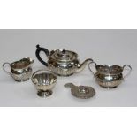 John Henry Rawlings, an Edwardian silver three piece bachelors tea service of demi-reeded form,