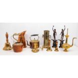 A collection of brass wares including fire irons, bells, candlesticks, French figure, kettles etc