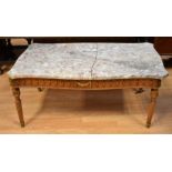 A Reproduction neo-Classical style marble-topped coffee table having ormolu detail and reeded