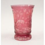 A Bohemian 19th Century pink etched glass vase, finely etched with a forest scene, with stag and
