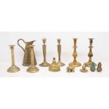 A collection of brass wares including candlesticks etc