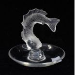 A Lalique Cristal France glass pin tray with frosted glass model of a fish to centre. Impressed mark