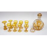 An Art Deco etched and amber flash glass decanter and six glasses, together with one glass, two