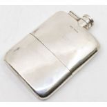 A George V silver hipflask plain body detachable drinking base, engraved with coronet, hallmarked