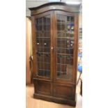 Early 20th Century oak leaded and stained glass bookcase Art Nouveau with four internal book shelves