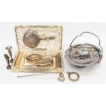 A matched George V plain silver mounted dressing table set comprising mirror, two hair and two