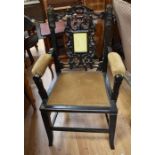 Black lacquered Victorian chair with Royal detail and carved photo frame to back rest of Queen