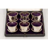 A set of six George V plain silver napkin rings, hallmarked by Walker & Hall, Sheffield, 1925,