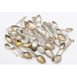 A collection of early 20th Century mainly American silver souvenir spoons, some Canadian, all with