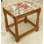 Workshop of Robert 'Mouseman' Thompson a four legged oak stool with tapestry seat. Dimensions approx