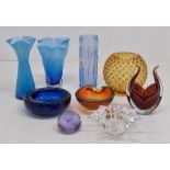 A collection of mixed mid- to late-20th century coloured and studio glasswares, including vases,