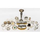 A collection of 19th & 20th Century silver to include: eight silver napkin rings, two silver mounted