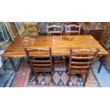 Wilf Hutchinson. English oak dining table with 4 chairs and 2 carvers. Good condition. Length of