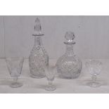 Collection of cut glasses and decanters