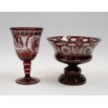 A Bohemian ruby flash glass pedestal bowl, etched with design, together with a large goblet of