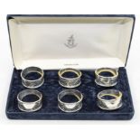 A set of six Victorian style engraved silver napkin rings, hallmarked London, 2000, approx 2.78