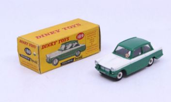 Dinky: A boxed Dinky Toys, Triumph Herald, Reference No. 189, two-tone green and white body, correct