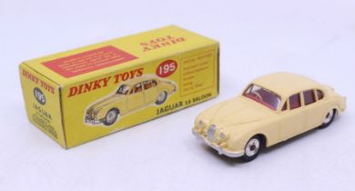 Dinky: A boxed Dinky Toys, Jaguar 3.4 Saloon, Reference No. 195, cream body with silver hubs.