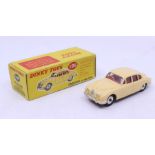 Dinky: A boxed Dinky Toys, Jaguar 3.4 Saloon, Reference No. 195, cream body with silver hubs.