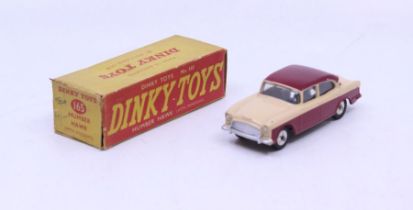 Dinky: A boxed Dinky Toys, Humber Hawk (with Windows), Reference No. 165, beige and maroon two-