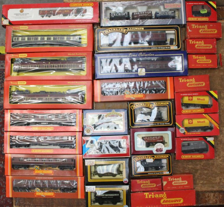Model Railway: A collection of assorted boxed OO Gauge coaches and rolling stock to include: