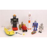 Tinplate: A collection of assorted battery operated and clockwork tinplate and other space related