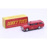 Dinky: A boxed Dinky Toys, Canadian Fire Chief's Car with Windows, Reference No. 257, red body.
