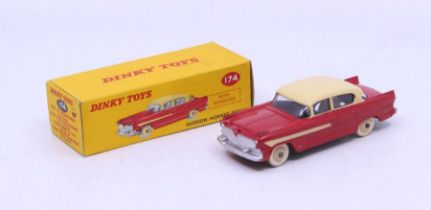 Dinky: A boxed Dinky Toys, Hudson Hornet Sedan, Reference No. 174, two-tone red and cream with